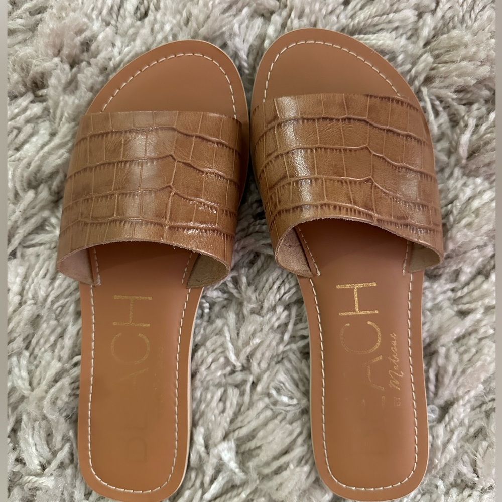 Tan sandals. BEACH brand size 7